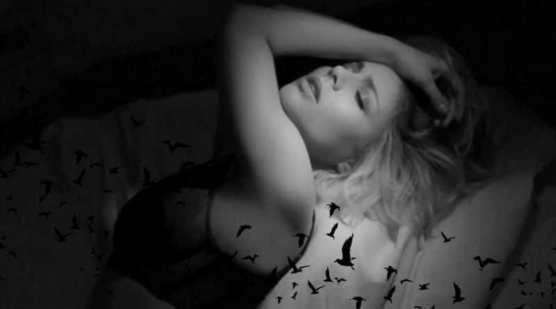 Tina Karol with a microphone