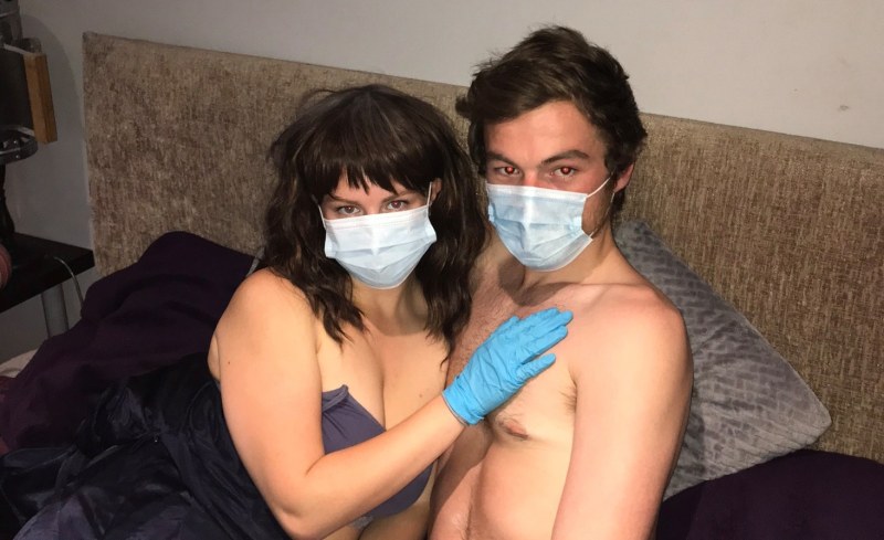 Naked in a medical mask