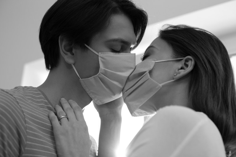 Kiss in a medical mask