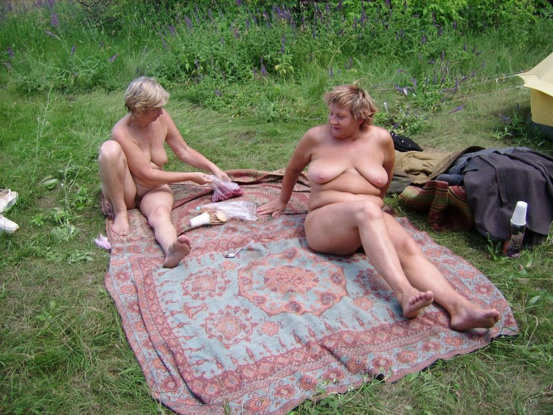 Mature nudists in nature