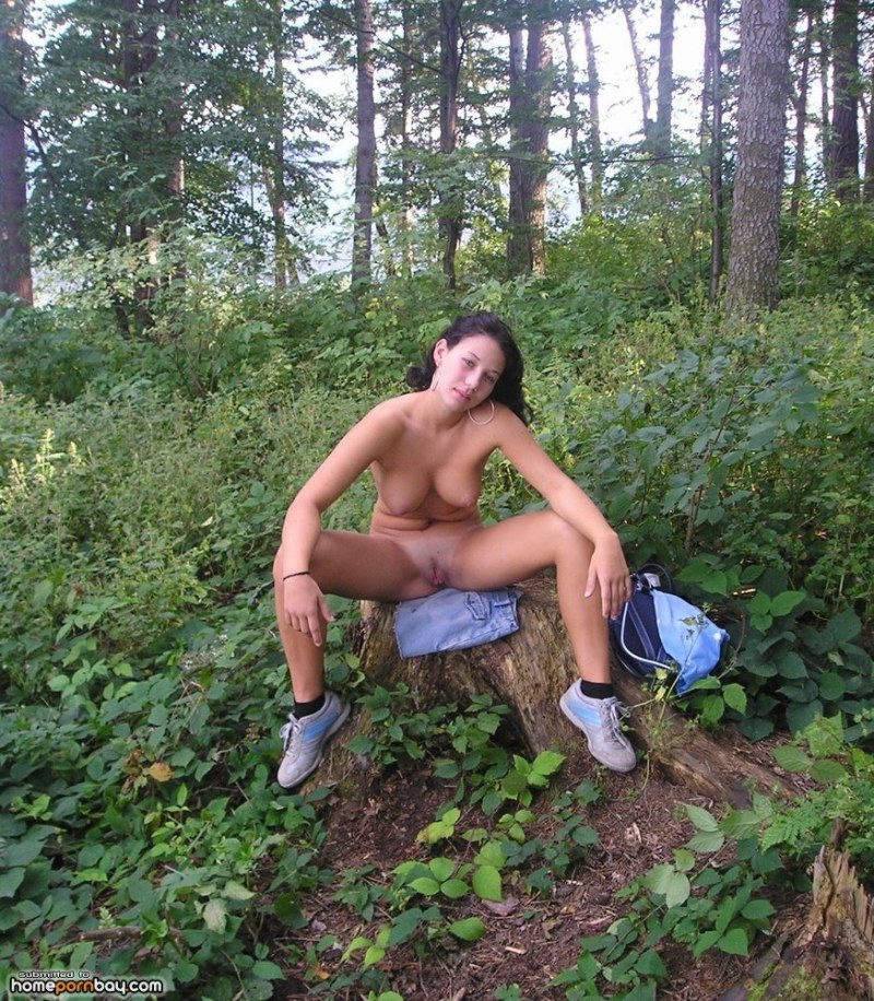Erotic photo shoot in the autumn forest