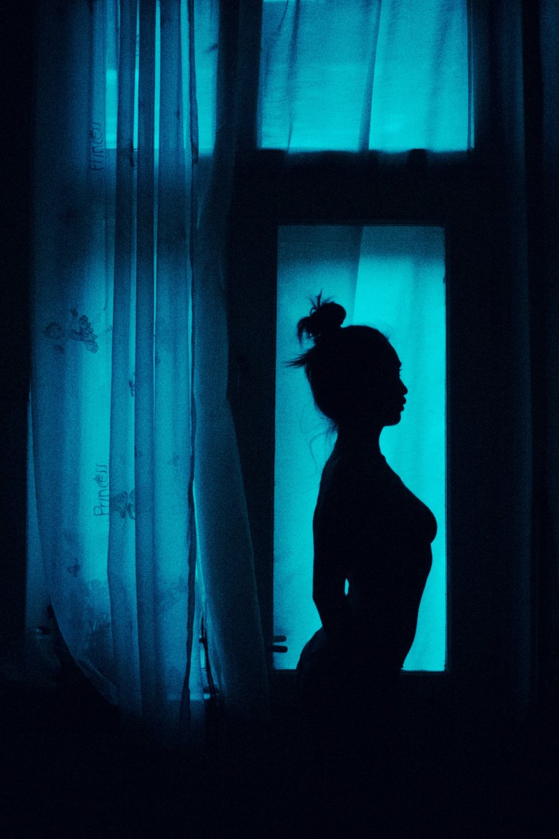 Woman's silhouette in the window