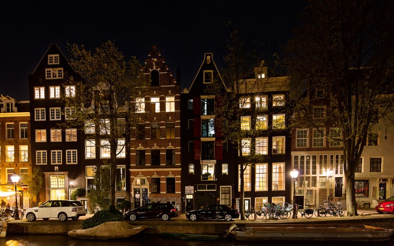 The window is in front of the film