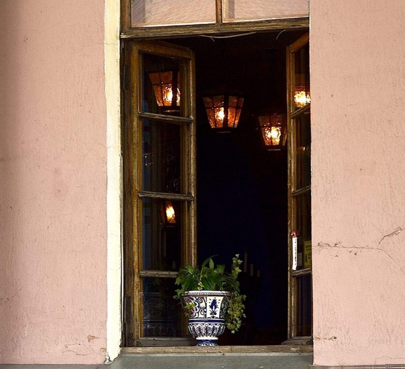 The girl dresses up in the window