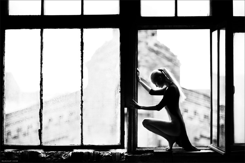 Looks out of the blinds