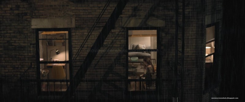 Girl sits on the window