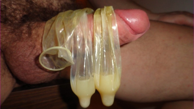 Male member in condom