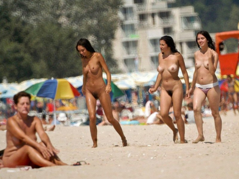 Naked girls on a public beach