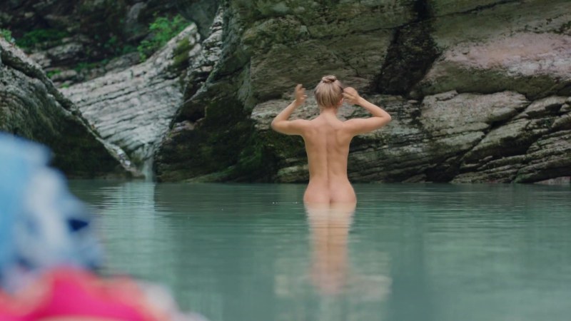 Walks naked with flowers