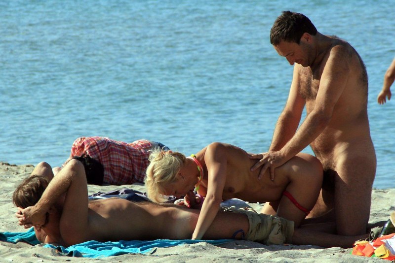 Amateur gangbang on the beach