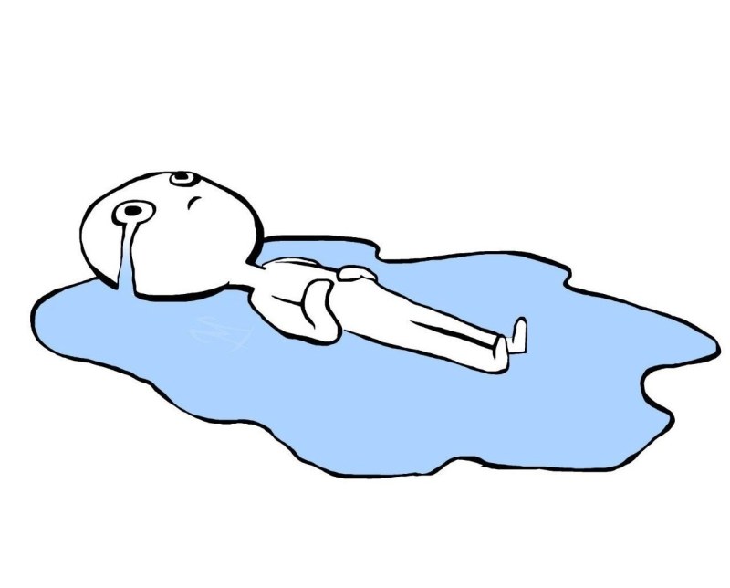 Man lies in a puddle of tears