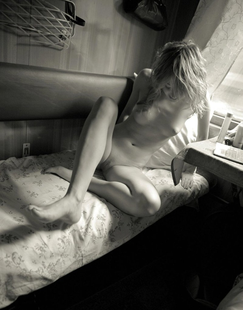 Woman undresses on the train
