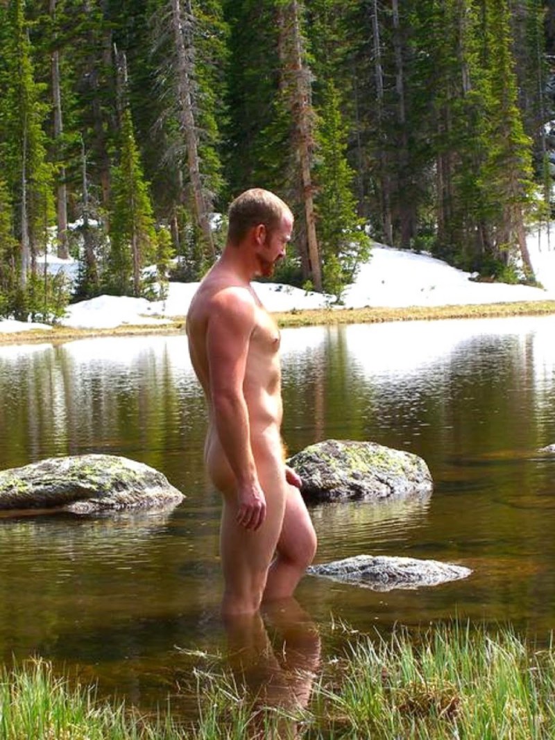 Naked women and men in nature