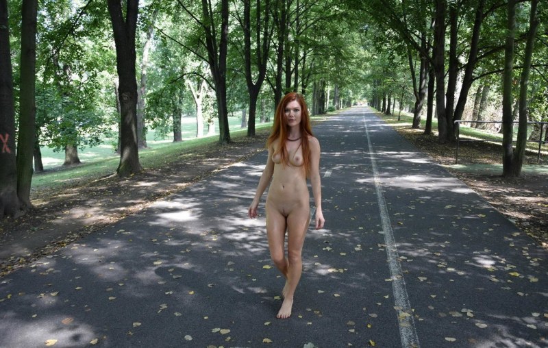 The girl walks around the city without panties and ends