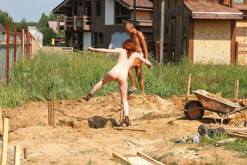 Naked women sunbathe in the country