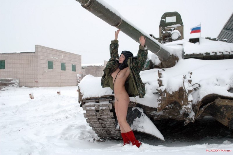 Nude girls near tanks