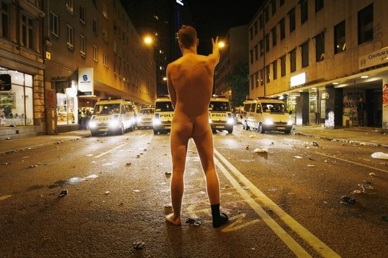 Naked men on the streets of cities