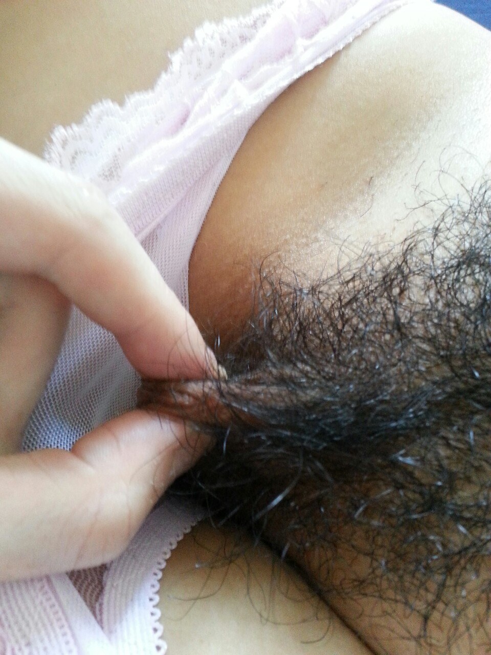 Pussy hair showing outside of panties