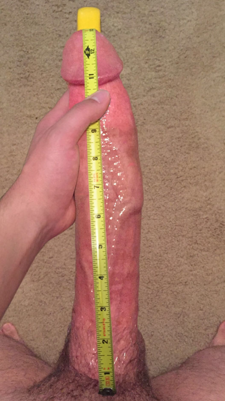 The girl measures the penis