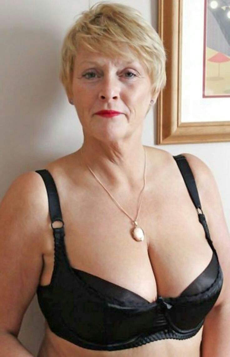 Beautiful breasts of a mature grandmother