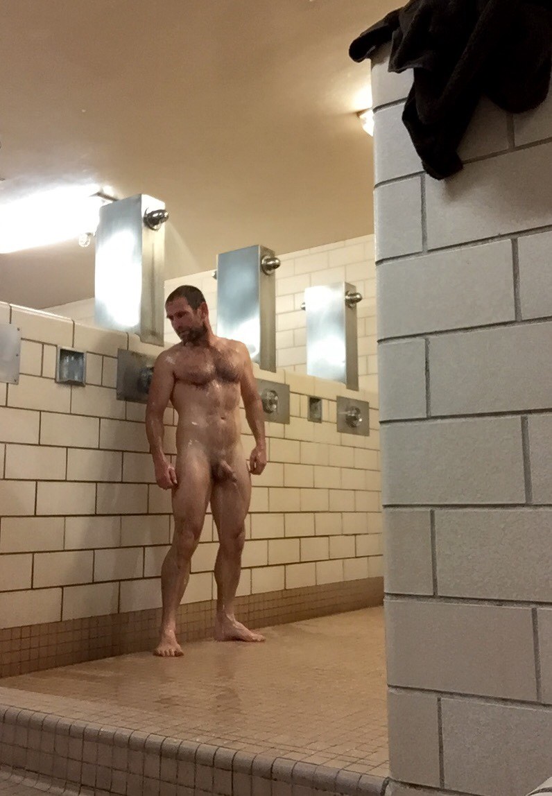 Two naked guys in the bathroom
