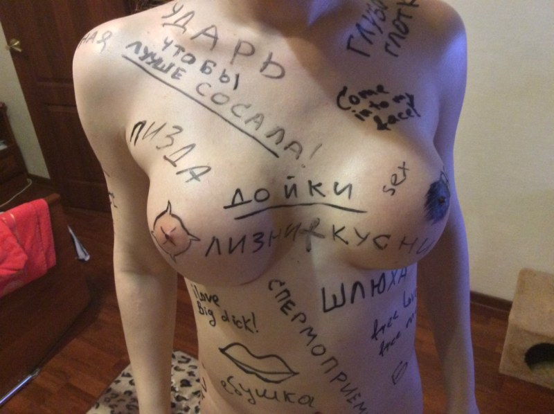 Militical inscriptions on a bare body