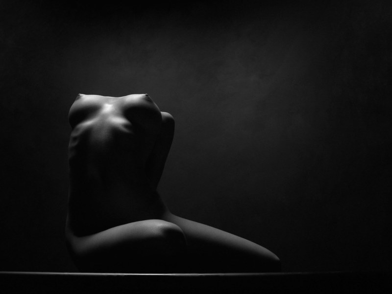 Nude on a black background