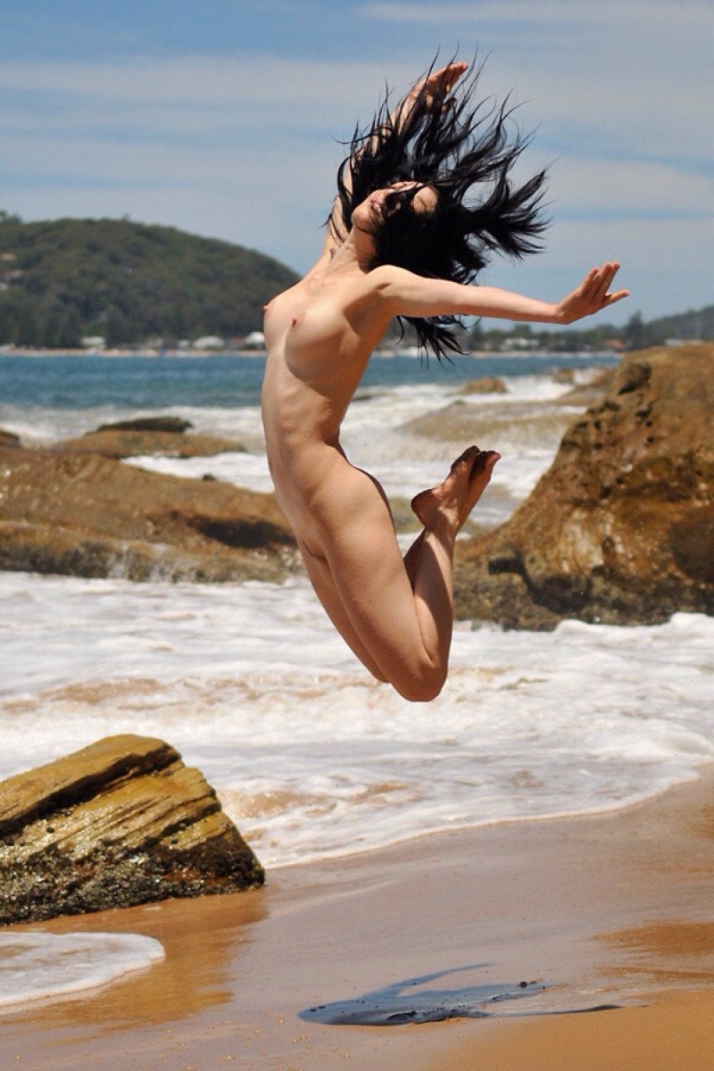 Naked girls jump into the water