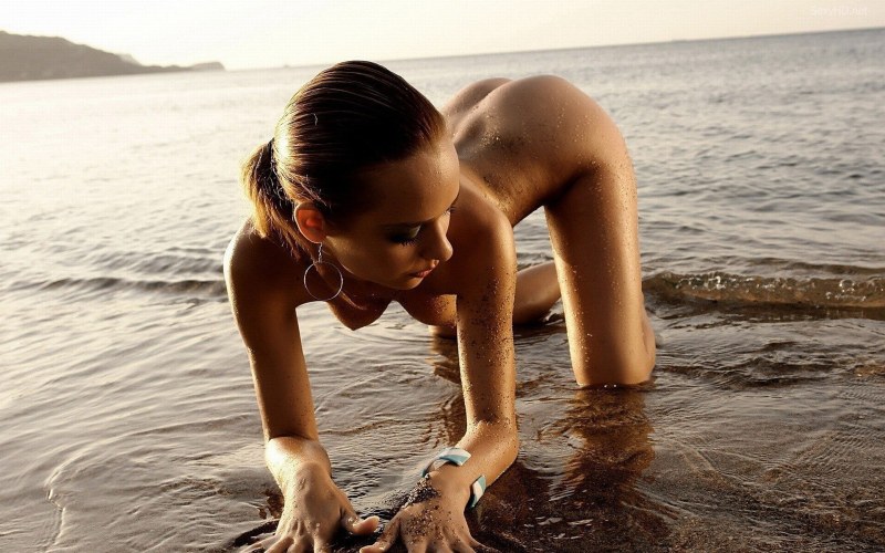 Erotic photo shoot on the shore