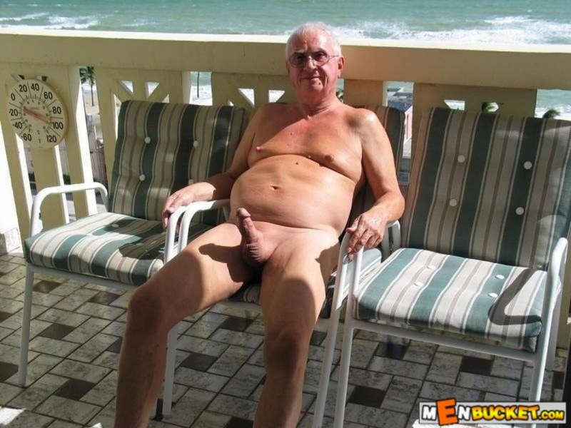 Naked men and women on the beach