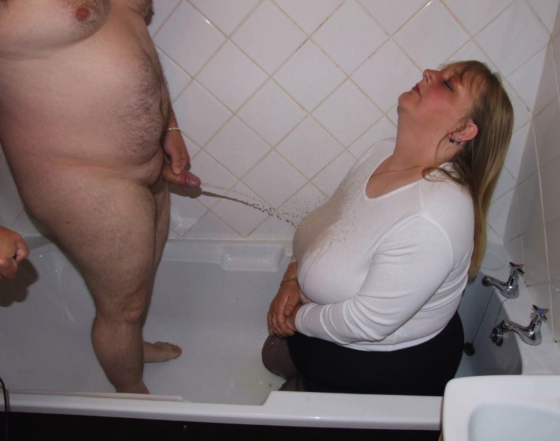 Pissing of a mature pair in the toilet