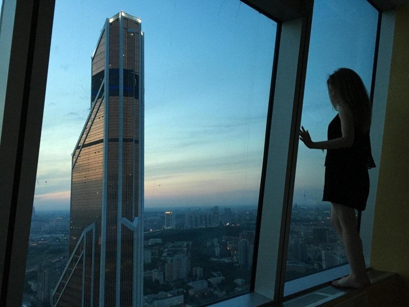 Victoria Odintsova on the roof of a skyscraper