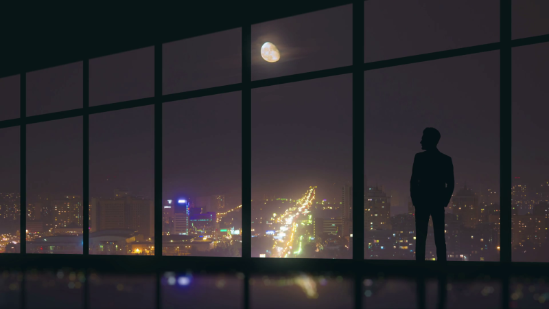 Man on the background of the window