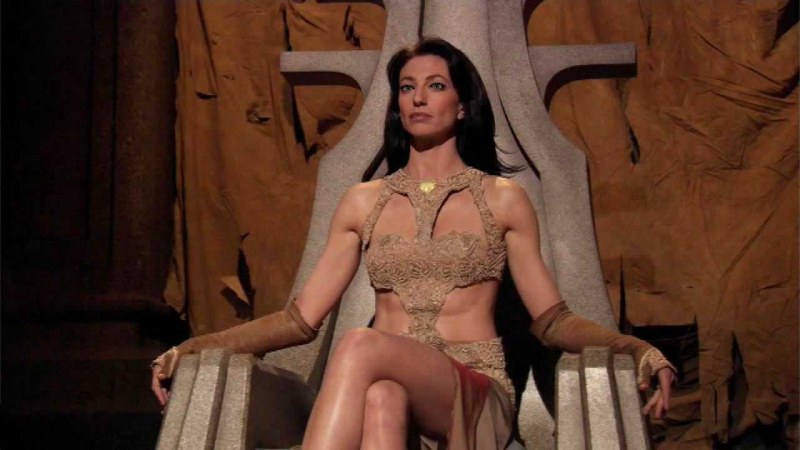 Mulatto with big tits by the pool