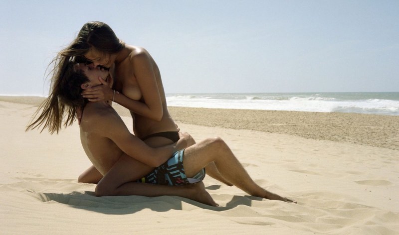 A guy with a girl at sea