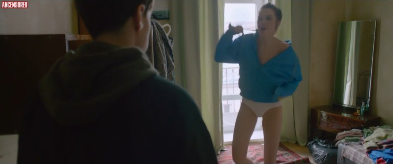 A man and feminine in bed