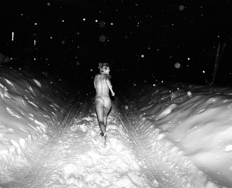 Naked women drip snow