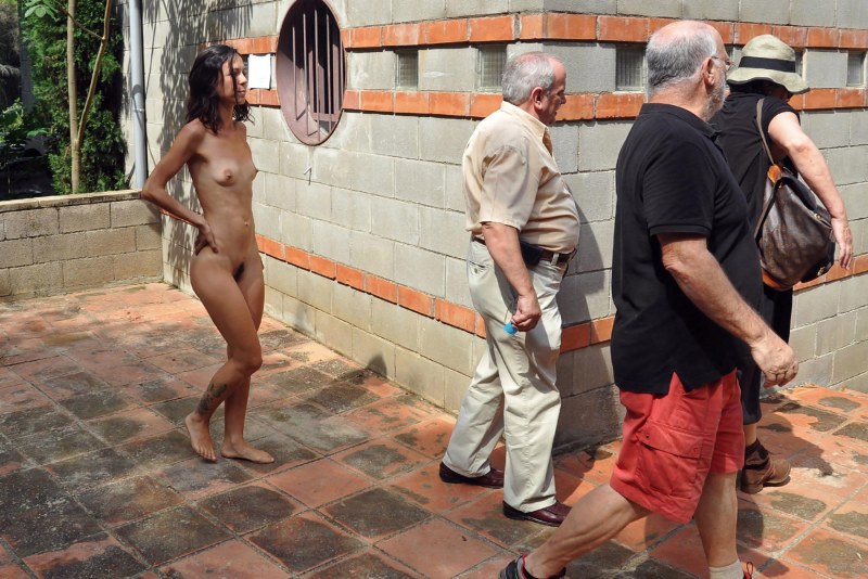 Naked among people one minute