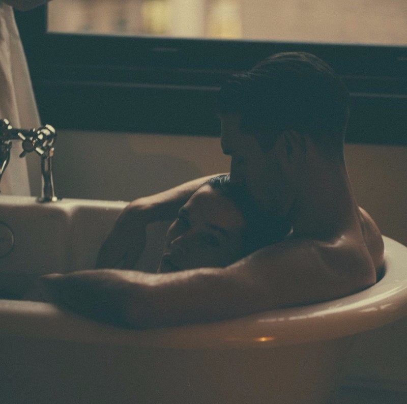 A guy with a girl in a bath