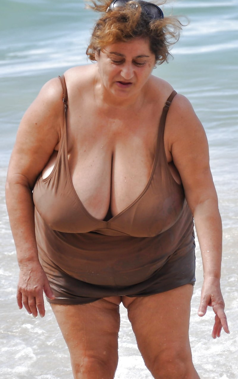 Older women on the beach topless