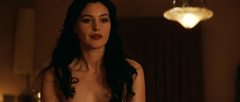 Monica Beluchai in a short skirt