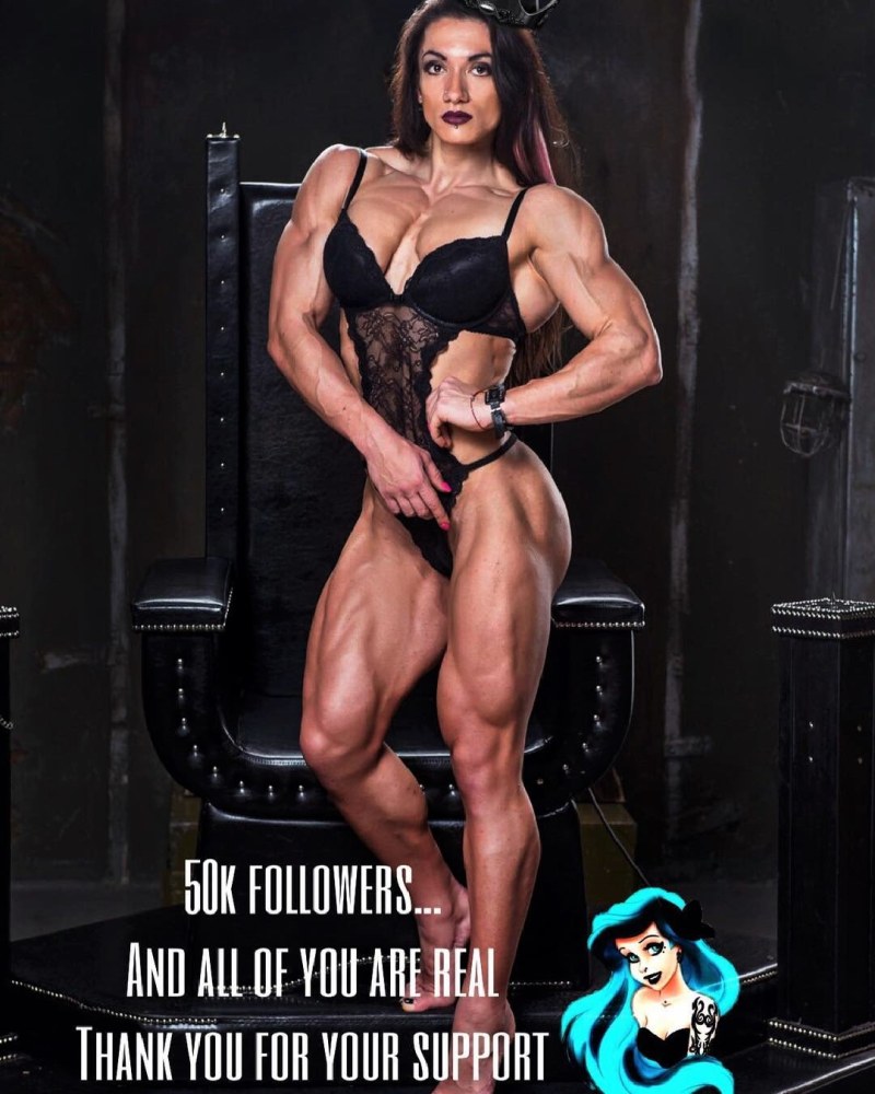 Muscular woman against