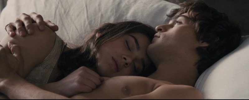 The couple caresses each other