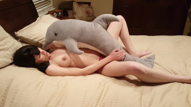 Girl with a horse phalloimitator