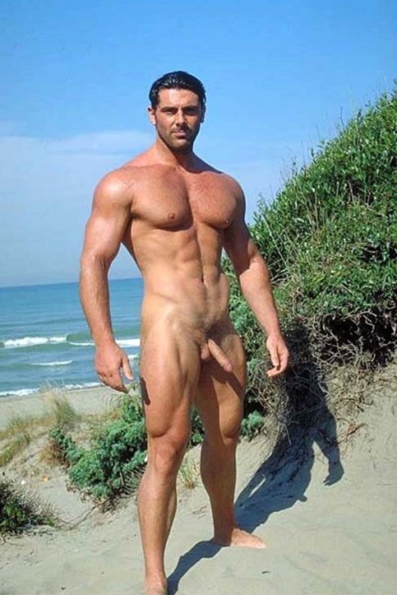 Sports naked guy on the beach