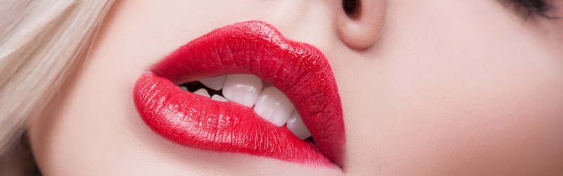 Blondes with red lips of the neckline