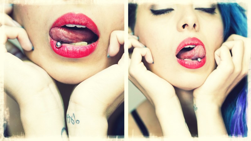 Beautiful girls with a pierced tongue