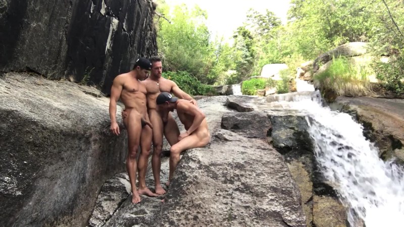Young naked guys in the forest