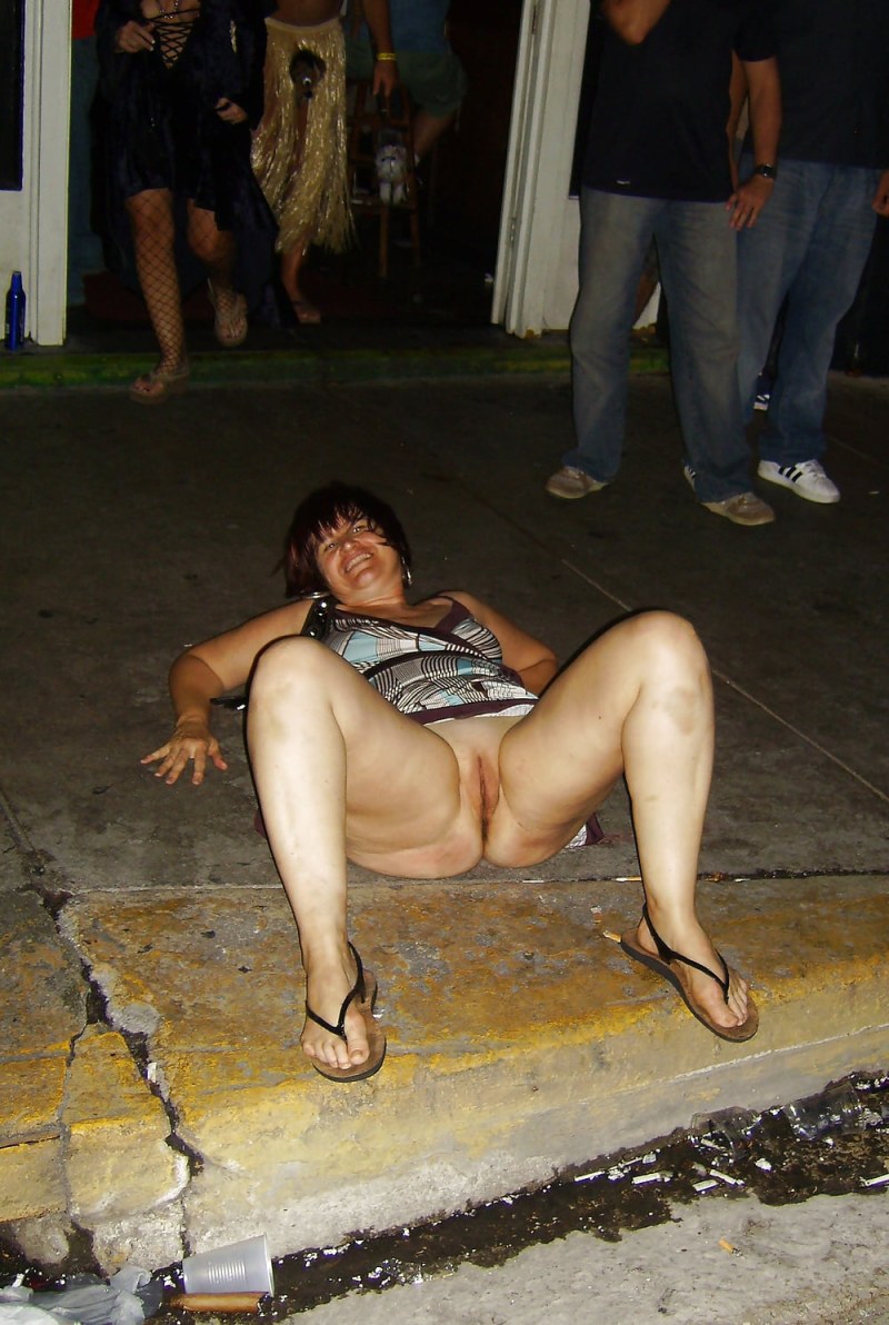 Drunk naked women on the street