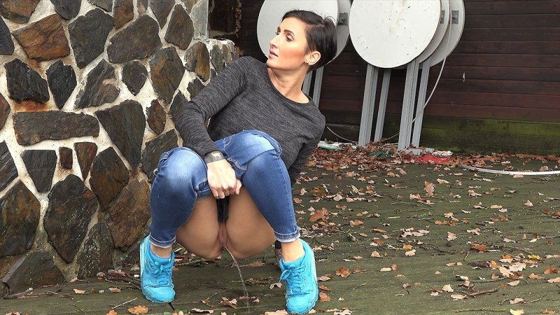 Girls pour in the toilet